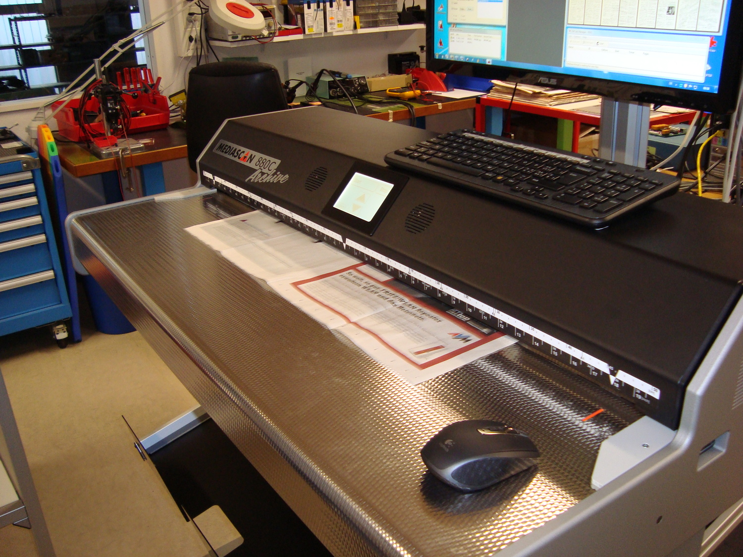 400,000 newspaper pages run through the scanner