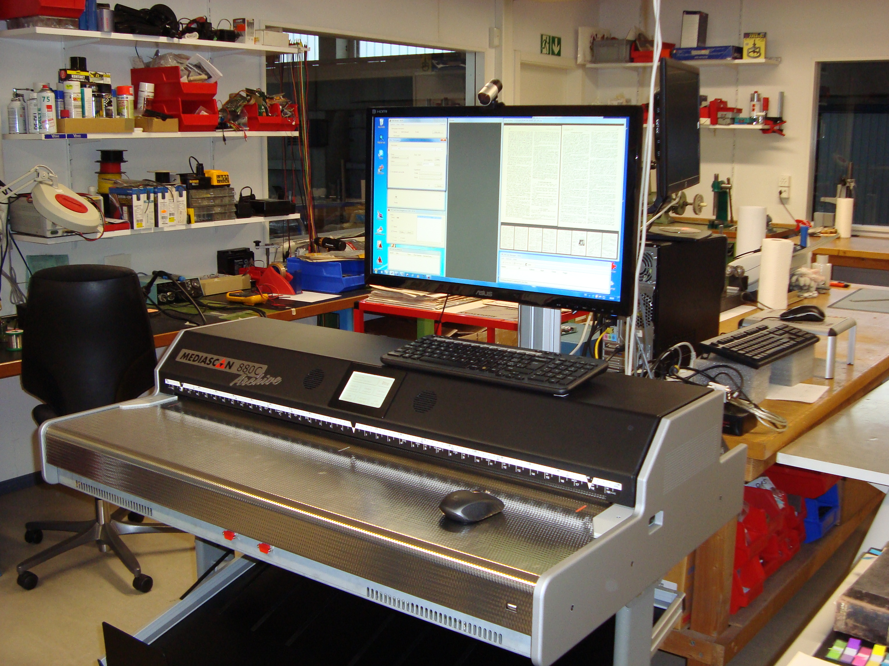 400,000 newspaper pages run through the scanner